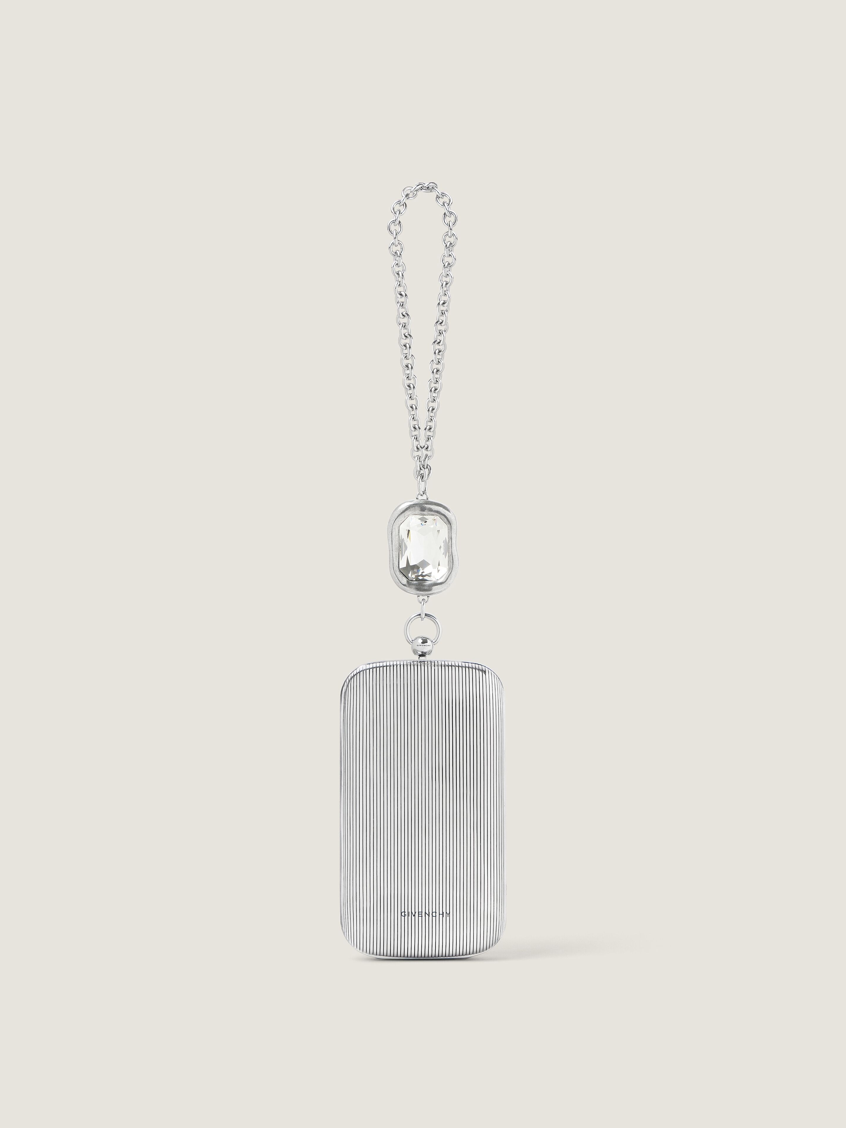 Evening clutch in metal with crystal jewel